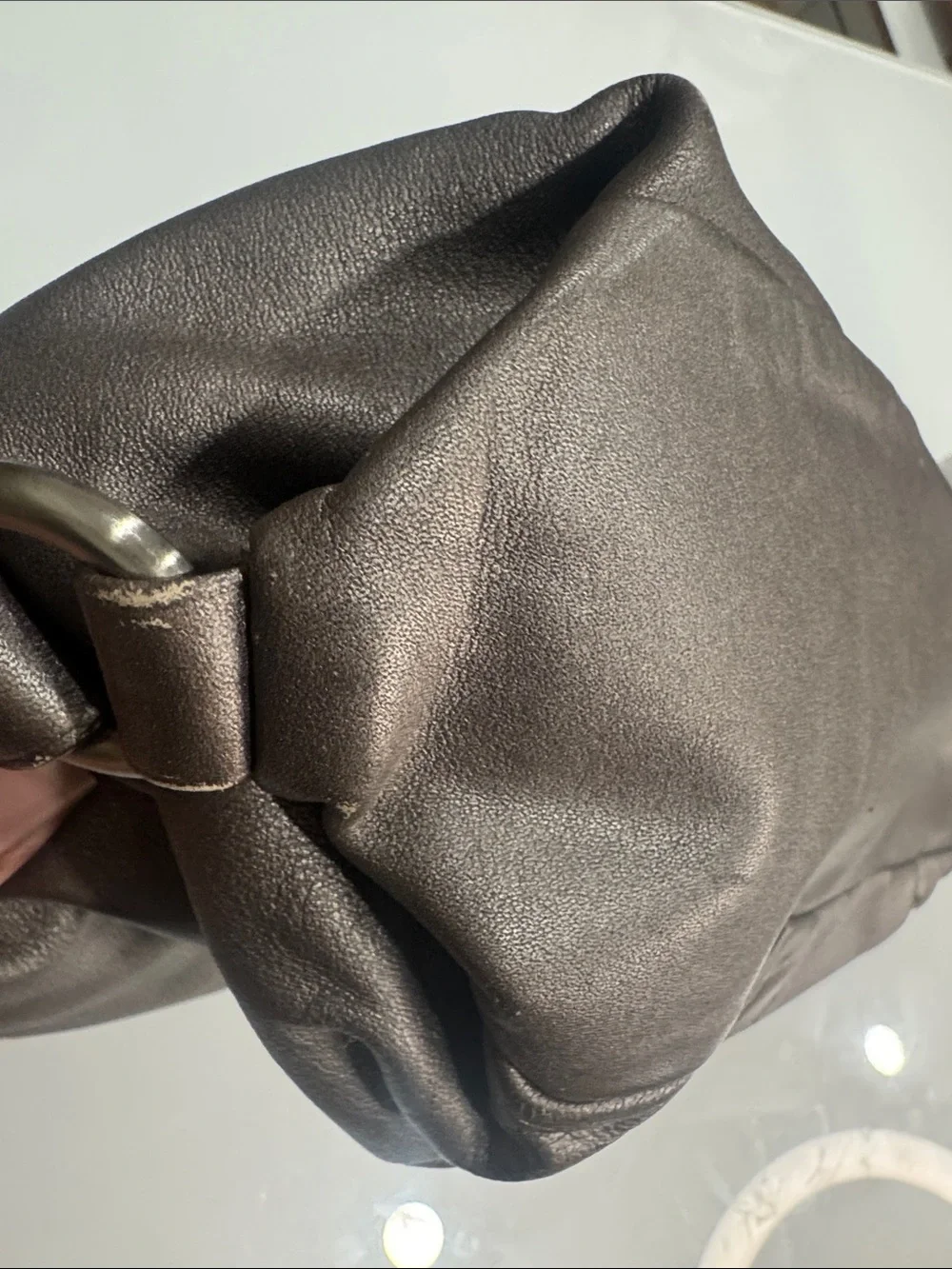 Coach Y2K Madison hobo bag featuring metallic pewter leather and silver studded
